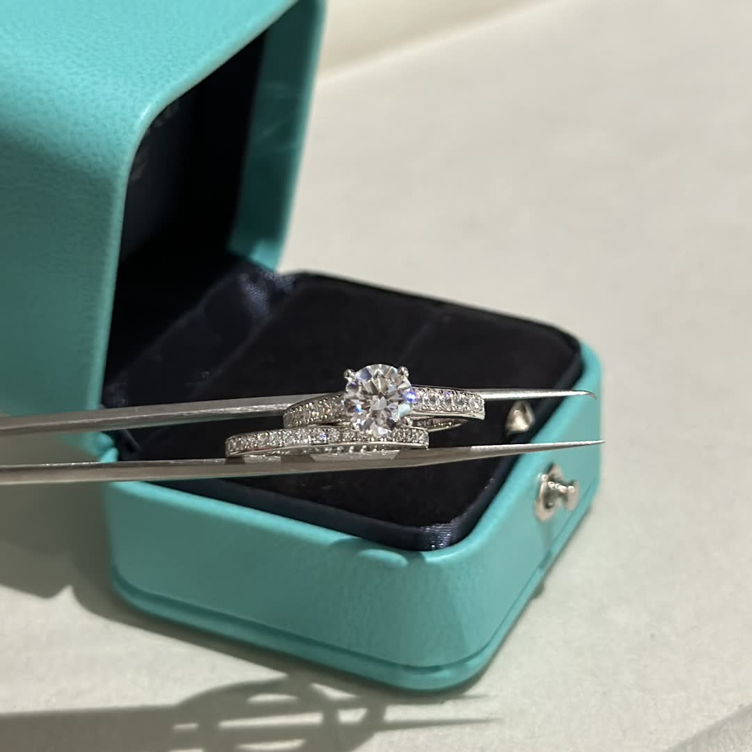 Tiffany & Co. Solitaire Ring with Diamond Band